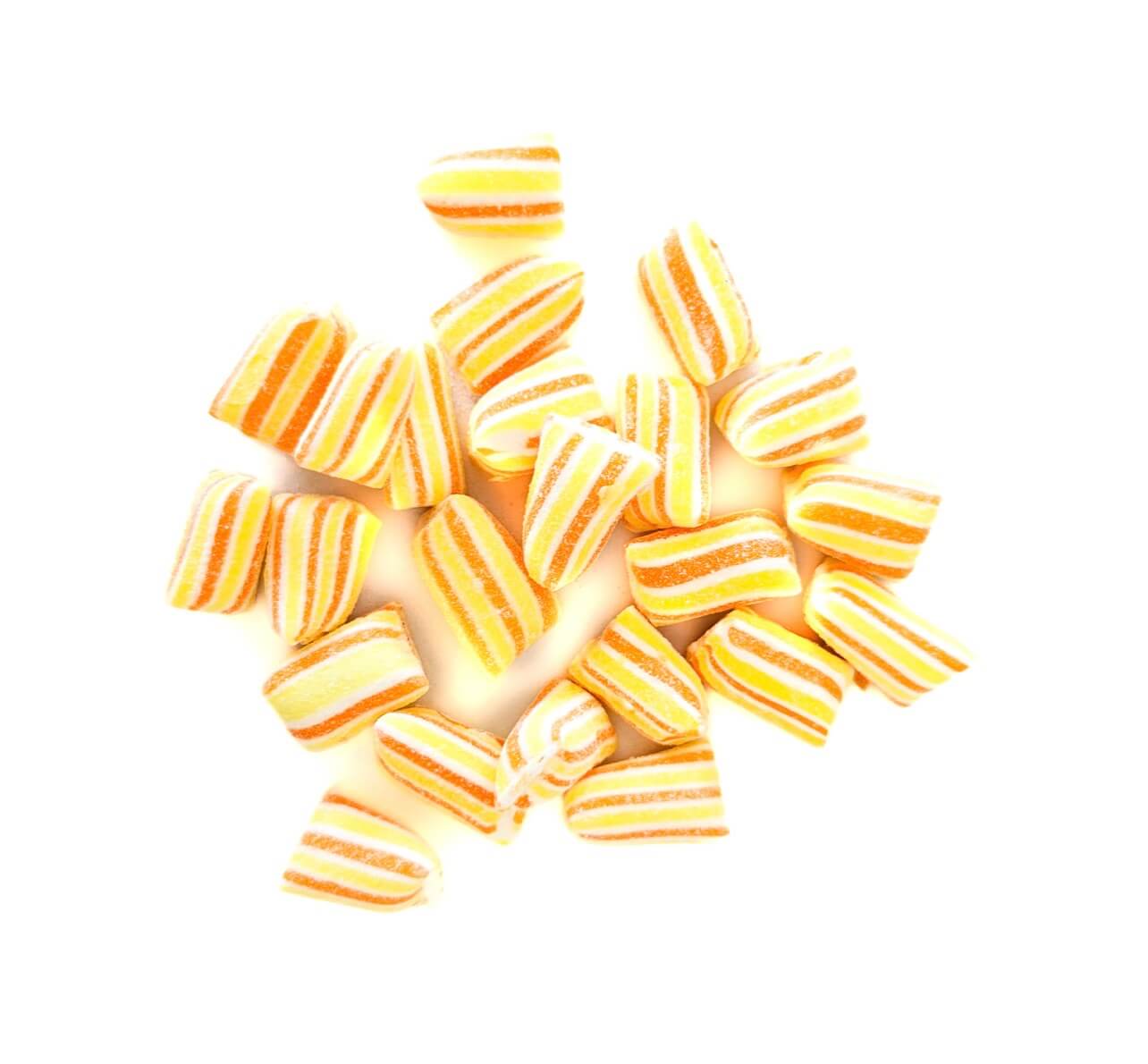 Pineapple Bonbons with bold yellow and orange stripes, offering a sweet and tart flavor experience.