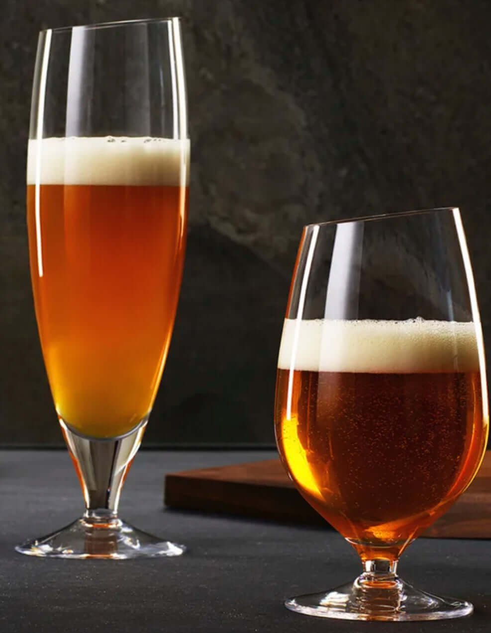 Beer Glasses showcasing the rich amber color and frothy head of beer in elegant designs.