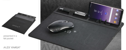 Black desk organiser with phone, mouse, and other items on a dark surface