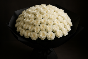 A bouquet of 75 white roses in black paper