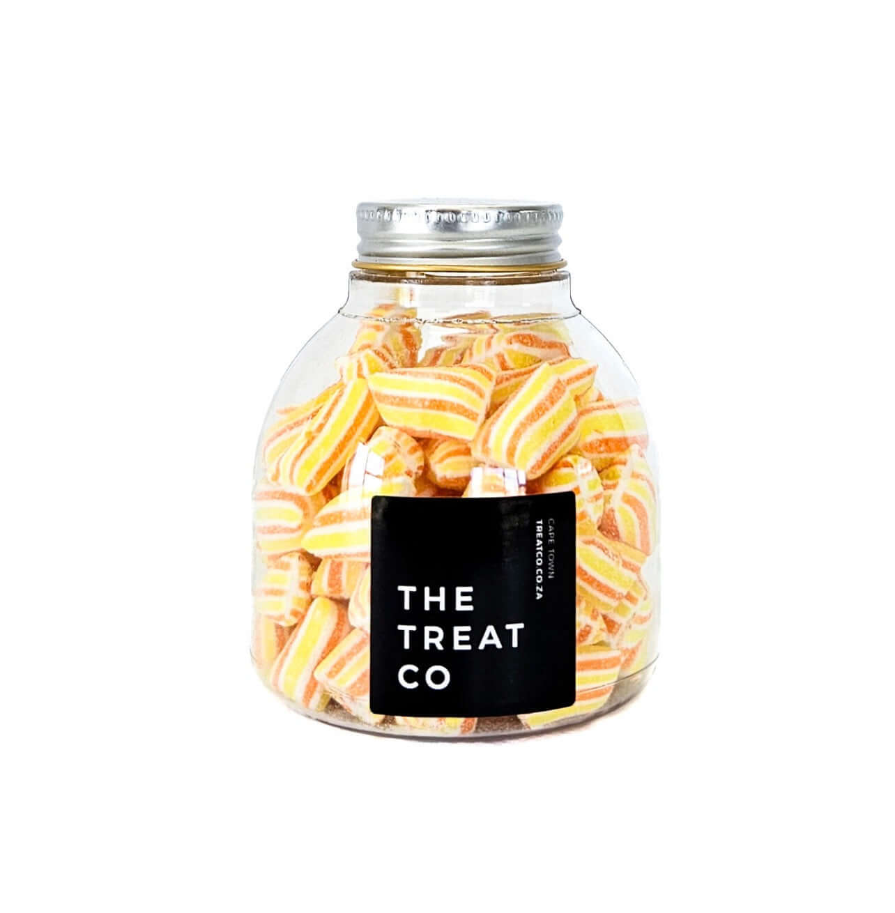 Pineapple Bonbons in a glass jar by The Treat Co, showcasing vibrant yellow and orange striped candies.