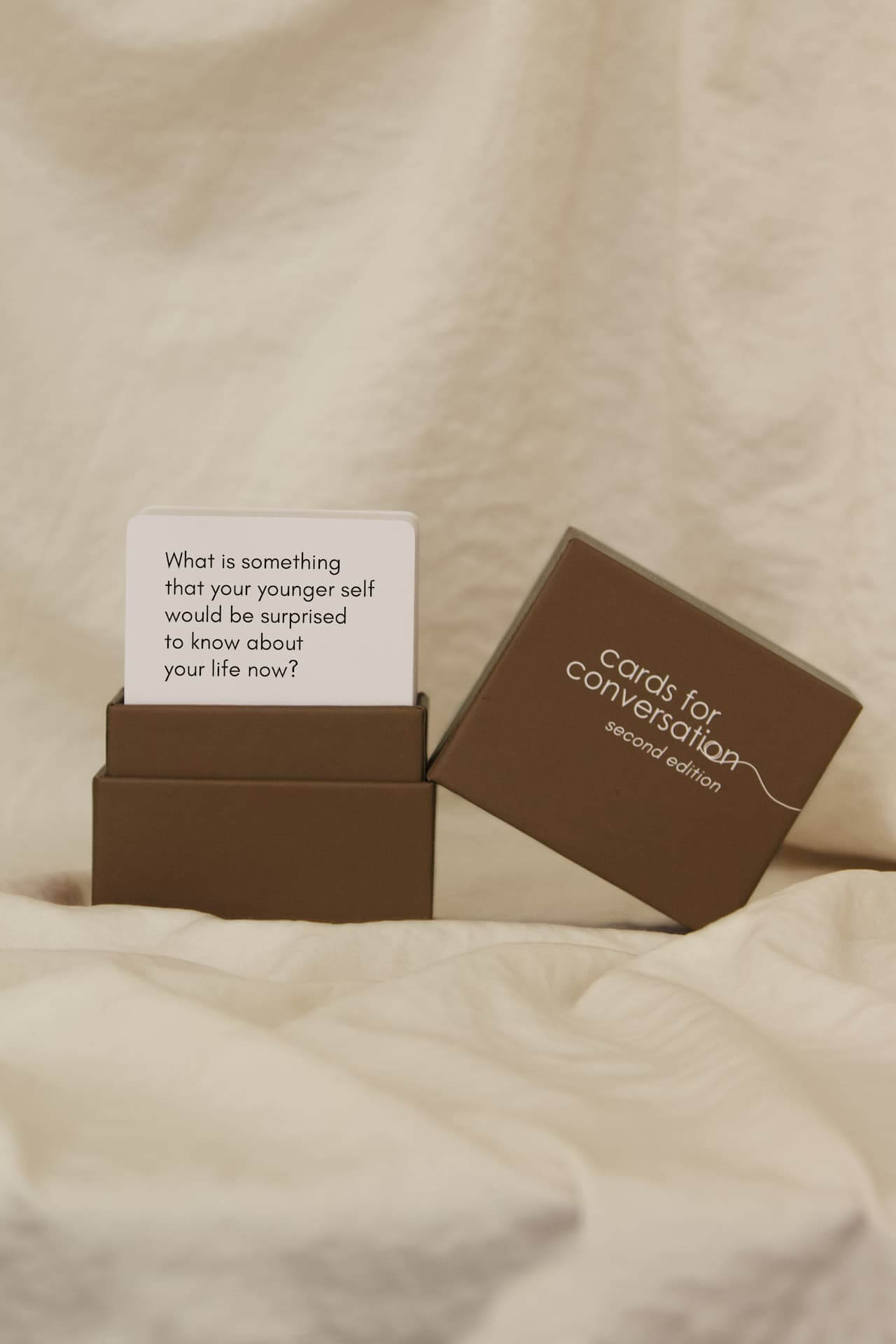 Cards for Conversation: Second Edition game box featuring thought-provoking question card.