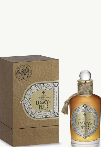 The Legacy Of Petra by PENHALIGON’S fragrance bottle and box showcasing its rugged charm.