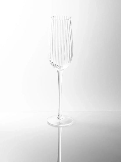 Sur La Table Textured Linear Champagne Glass 240ml with ribbed design and elongated stem.