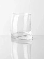 Dotum Tumbler Curved Glass elegantly showcasing a stylish design perfect for enhancing your drink experience.